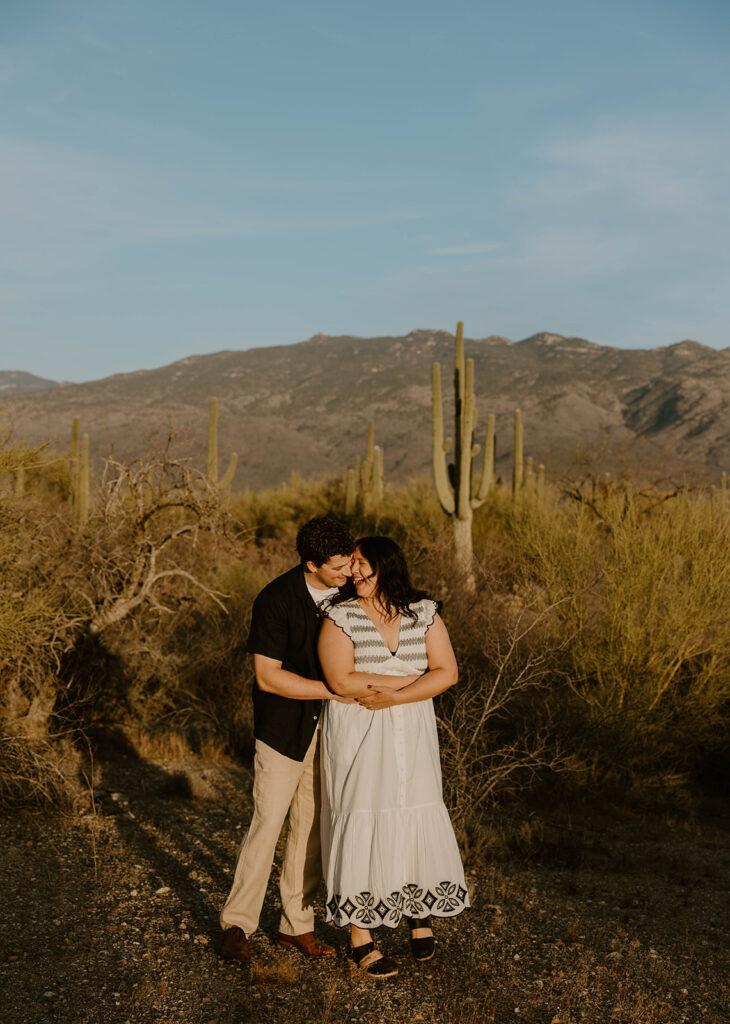 Romantic desert engagement photo at one of the best engagement photo locations Tucson offers
