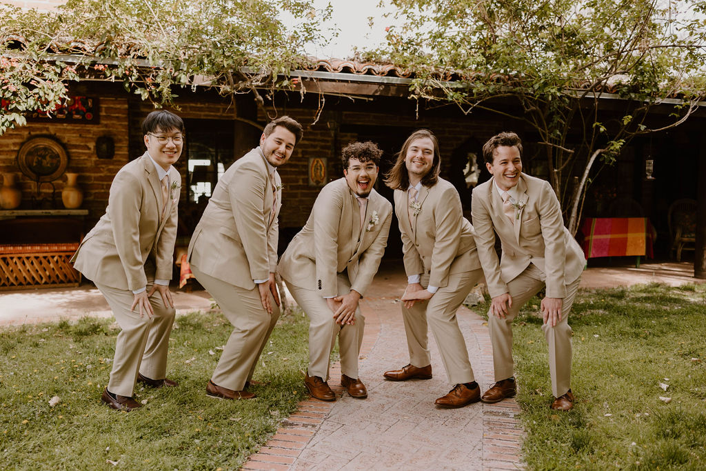 Arizona based wedding photographer captures candid groom and groomsmen