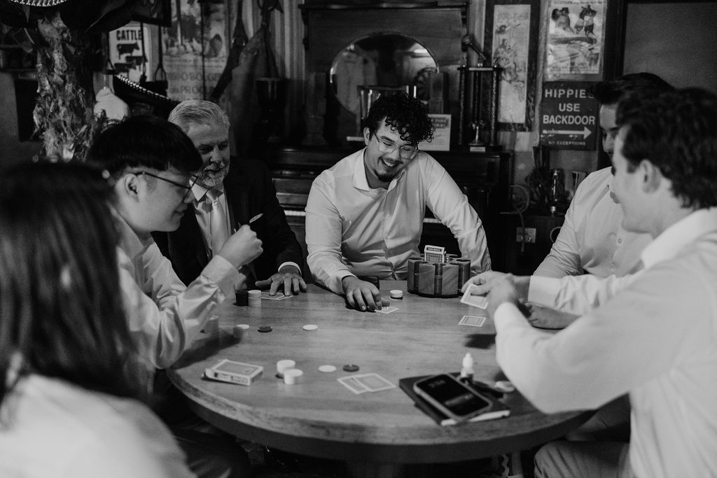 Tucson based, Arizona Micro Wedding Photographer takes candid groom and groomsmen photos