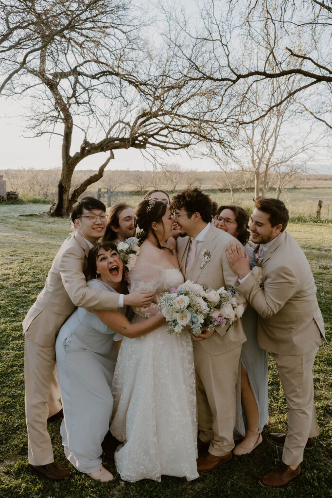 Tucson based, Arizona Micro Wedding Photographer takes garden party wedding photos at wedding party candid Agua Linda Farm