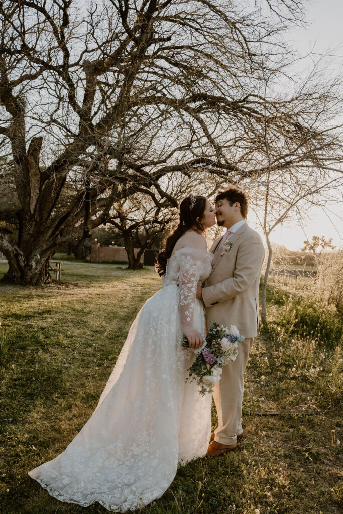 Tucson based, Arizona Micro Wedding Photographer takes garden party wedding photos golden hour bride and groom at Agua Linda Farm