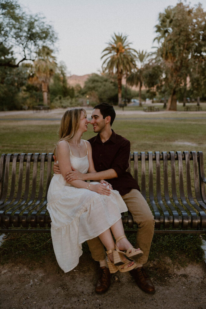 Couple holding hands during their couples session at sunset