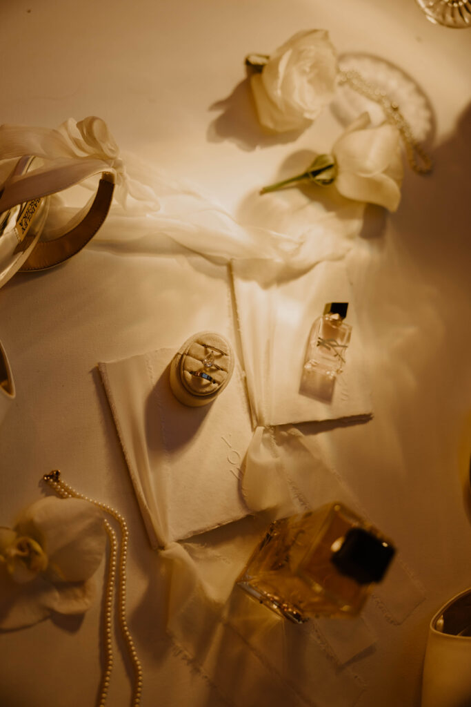 Wide shot of full flat lay featuring all bride wedding day details
